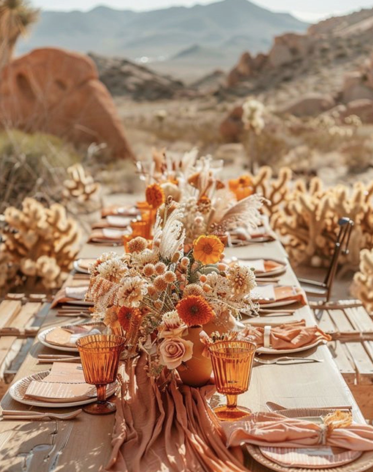 Warm outdoor tablescape with desert florals