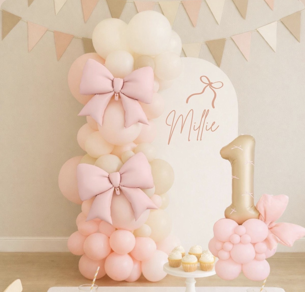 Soft pink bow birthday backdrop with balloons